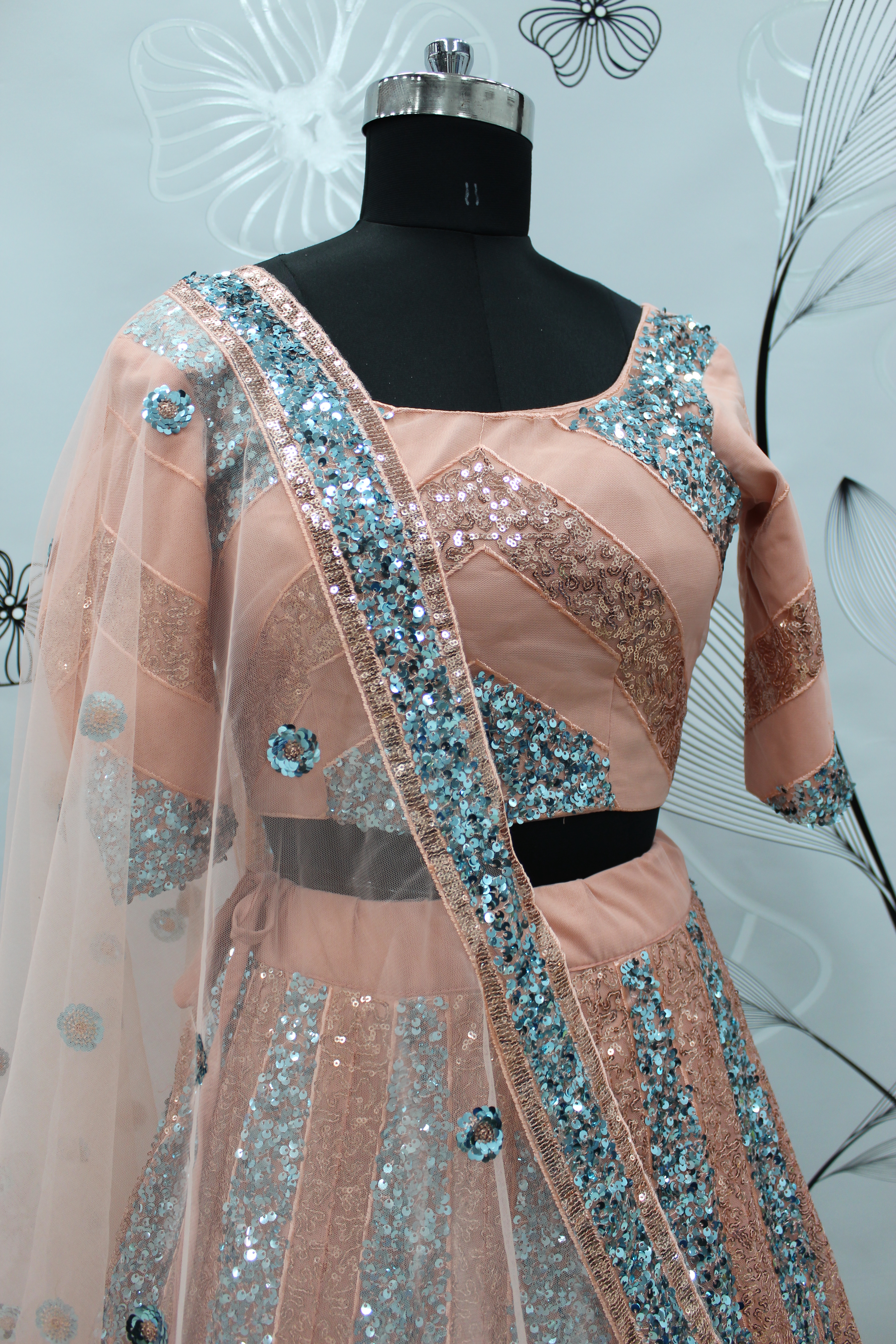 Embroidered work Net Lehenga Choli in Peach