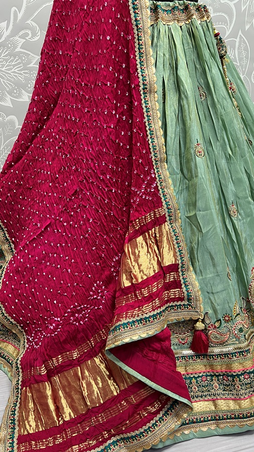 Pure Gajji silk Bandhani Dupatta and Gadhwal silk crafted Wedding Wear Lehengacholi 